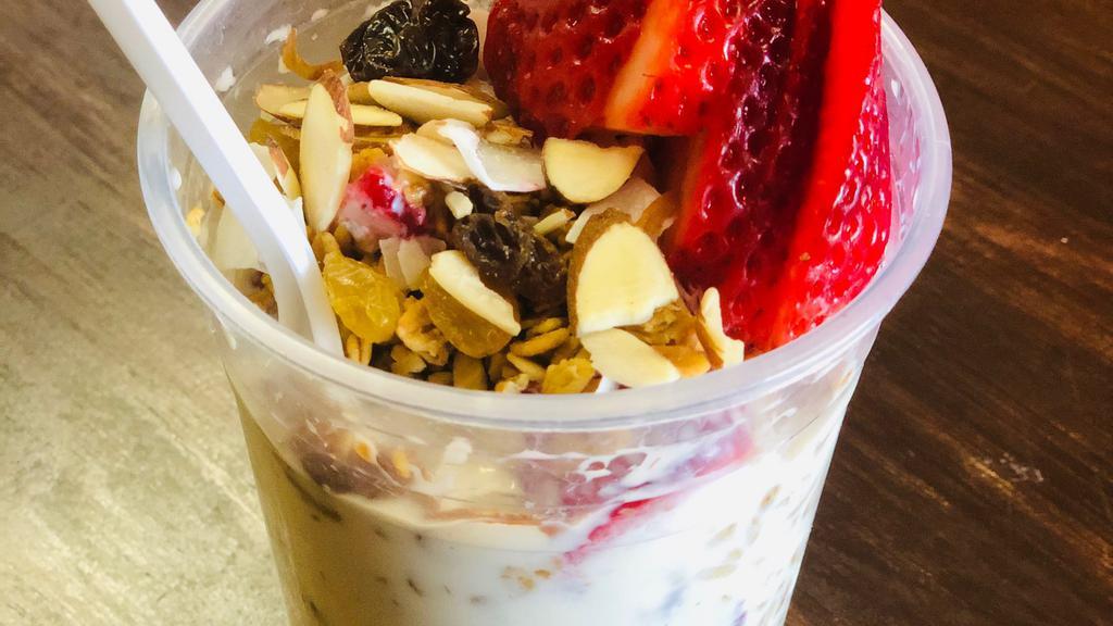 Strawberries & Cream · Topped with granola, rice puffs, raisins, almonds and coconut