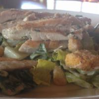 Chicken Caesar Salad · Fresh crisp romaine lettuce, tossed with a creamy caesar dressing, grated parmesan cheese, c...
