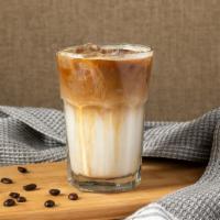 Iced Caramel Macchiato · We combine our rich, full-bodied espresso with vanilla-flavored syrup, milk and ice, then to...