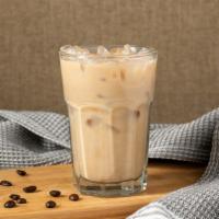 Iced Caffe Latte · Our dark, rich espresso is combined with milk and served over ice. A perfect milk forward co...