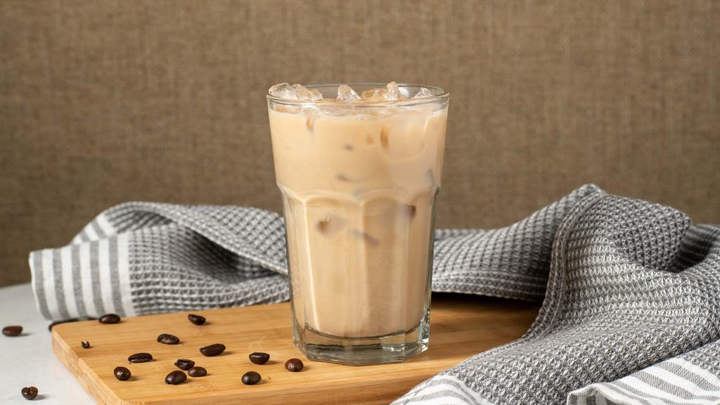Iced Caffe Latte · Our dark, rich espresso is combined with milk and served over ice. A perfect milk forward cool down.