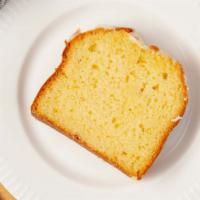 Iced Lemon Loaf Cake · This citrusy, buttery, moist lemon pound cake is topped with a sweet vanilla icing. Cake has...