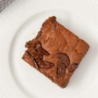 Double Chocolate Chunk Brownie · Rich chocolate brownie with premium cocoa and generous chunks of chocolate.