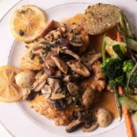 Filet Of Sands Dabs
 · Pan fried sand dabs topped with lemon slices, capers and white wine sauce.