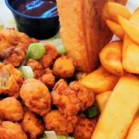 Gator Basket · Gator tail fried or grilled with your choice of side and a piece of Texas toast.