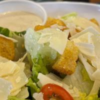 Caesar Salad · Romaine and iceberg lettuce mix cherry tomatoes croutons parmesan cheese
