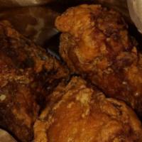 Fried Garlic Chicken (6) · Fried chicken pieces (drumstick and thighs).
