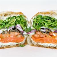 Lox Secial · Smoked Salmon, Red Onions, capers, Tomato Arugula, lemon & Dill Cream Cheese Spread, olive o...