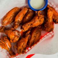 Jumbo Hot Wings · Our Famous Wings- 6 Delicious Flavors: Plain, BBQ, Mild, Chili Lime, Extra Hot, Lime Pepper.