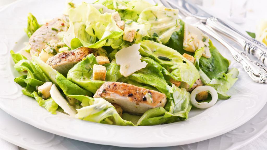 The Caesar Salad · Fresh salad made with hard boiled egg, parmesan cheese, romaine lettuce, and croutons with a side of house balsamic vinaigrette.