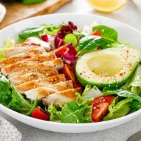 The Spinach Salad · Fresh salad made with spinach, raisins, sliced almonds, green apples, and goat cheese with a...