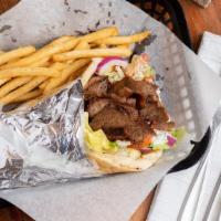 Lamb Gyro · With lettuce, onions, tomatoes, tzatiki sauce served on a pita bread.