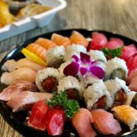 Ippo Deluxe A · Sushi 20 pieces - 4 salmon, 4 tuna, 2 yellowtail, 2 albacore, 2 seared paper albacore, 2 sea...