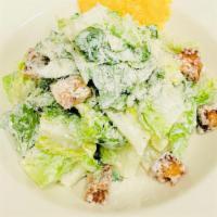 Little Gem Caesar · 450 cal. little gem lettuce, garlic croutons, parmesan cheese crisp, white anchovy