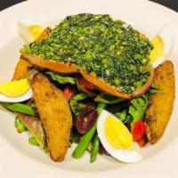 Niçoise Salad With Wild Salmon · Organic baby greens, herb and dijon roasted salmon, French green beans, kalamata olives, pet...
