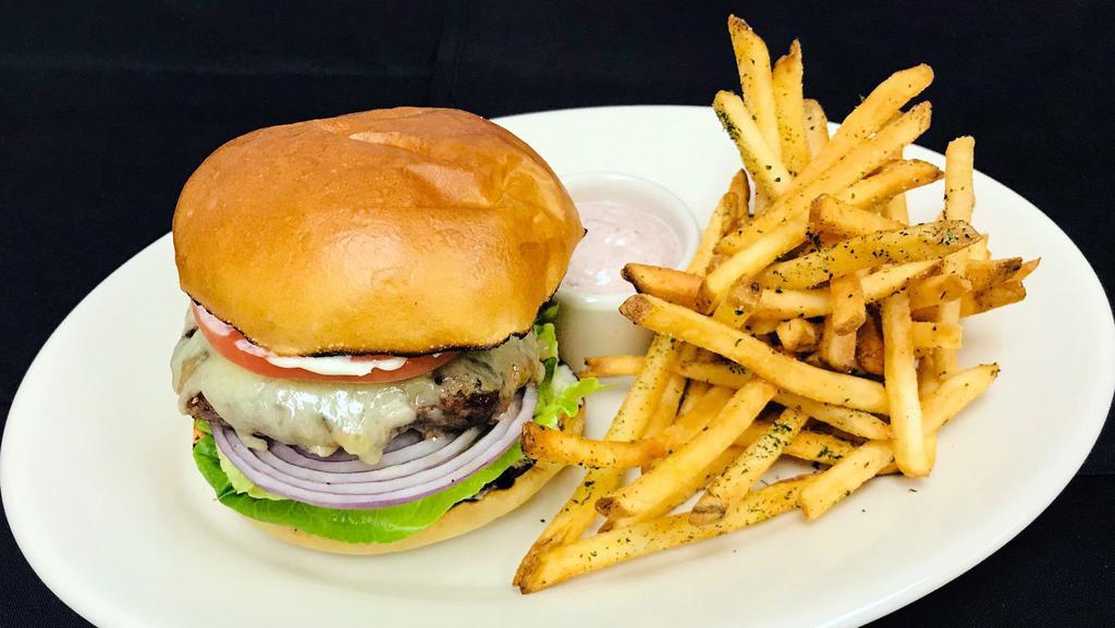 Nordstrom Burger* · 1420/1070 cal. lettuce, tomato, red onion, sharp white cheddar cheese, roasted garlic aïoli, toasted artisan bun.