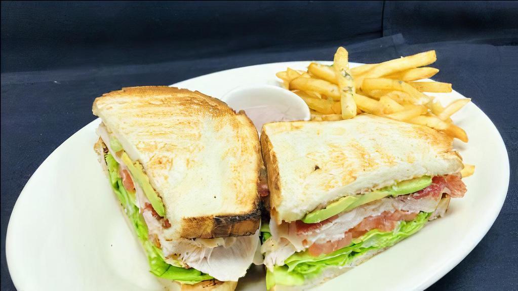 Roasted Turkey & Avocado Club · natural turkey, bacon, lettuce, tomato, peppercorn aioli, toasted country bread.