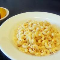 Macaroni & Cheese · multi grain macaroni, american cheese, served with fresh fruit cup 840 cal