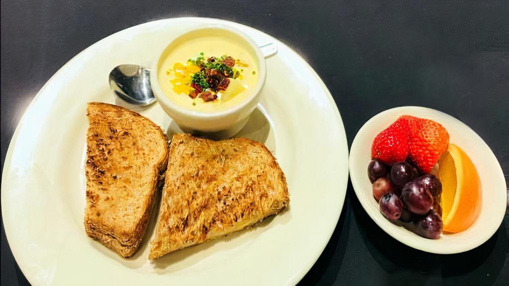 Grilled Cheese & Soup Of The Day · organic whole wheat bread, white cheddar cheese, signature soup of the day