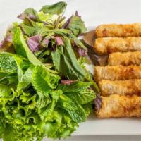 Vietnamese Egg Rolls - Chả Giò · House special shrimp and egg rolls, served with lettuce, asian herb and chili lime sauce. 3 ...