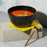 Tomato Soup · (vegetarian) roasted tomato, vegetable stock, creme fraiche.