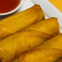 Egg Rolls · Four pieces stuffed with shredded cabbage, carrots, shiitake mushroom and glass noodles. Ser...
