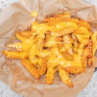 Cheese Fries · Nacho cheese fries.