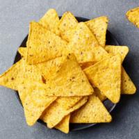 Nachos · Fresh tortilla chips garnished with tasteful poblano suiza, tres quesos, refried pinto beans...
