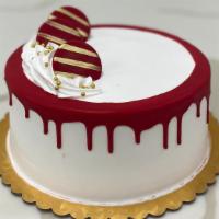 Red Velvet Cake · Layers of red velvet cake frosted with house of pastry’s own signature cream cheese filling....