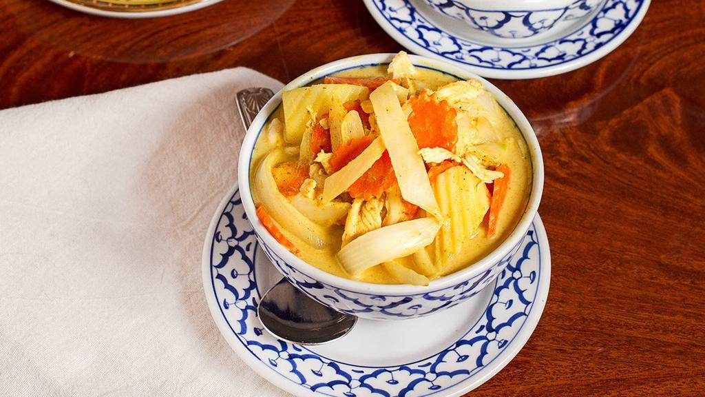Kaeng Ka-Ree (Yellow Curry) · Choice of chicken, or pork, or tofu with sweet potatoes, carrot and yellow onion, simmered in coconut milk - mild yellow curry.