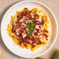 A New Bbq Hope (Mac) · Caramelized onions, bbq cheese sauce, and roasted spicy chicken cooked in a blend of creamy ...