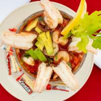 Shrimp Cocktail · Jumbo shrimp along with chopped avocado, cilantro, tomato, and onion in our special homemade...