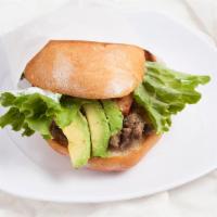 Torta · Your choice of: carne asada, shredded chicken, ground beef, pastor, or chile verde, served w...