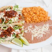Fish Taco Dinner · Two yummy fish tacos, served with rice and beans.