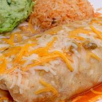 Grande Burrito · Grilled meat with rice and beans rolled in a large flour tortilla. Topped with ranchera sauc...
