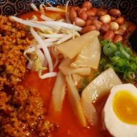 Spicy Pork Ramen · Thick Noodle, spicy pork, peanuts, green onion, corn, Bean Sprouts, bamboo, egg, tonkotsu so...