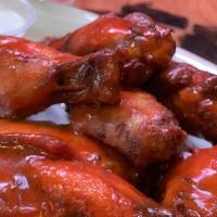 Chicken Wings · Choose from spicy, BBQ or sweet chili sauce.