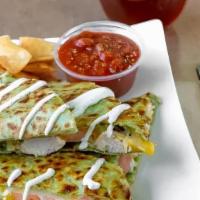 Chicken Quesadilla · Grilled Chicke, PepperJack, Cheddar, Sliced Tomato melted in a grilled Spinach Flour Tortill...