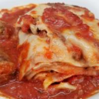 Lasagna Combo · In house made fresh pasta & marinara sauce. Served with a choice of 2 Meatballs and/or Sausa...
