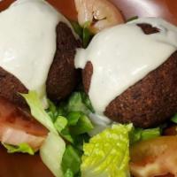 Falafel (1 Pc) · Deep fried fava and garbonzo beans topped with tahini sauce