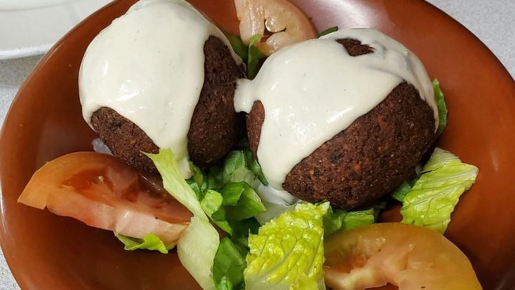 Falafel (1 Pc) · Deep fried fava and garbonzo beans topped with tahini sauce