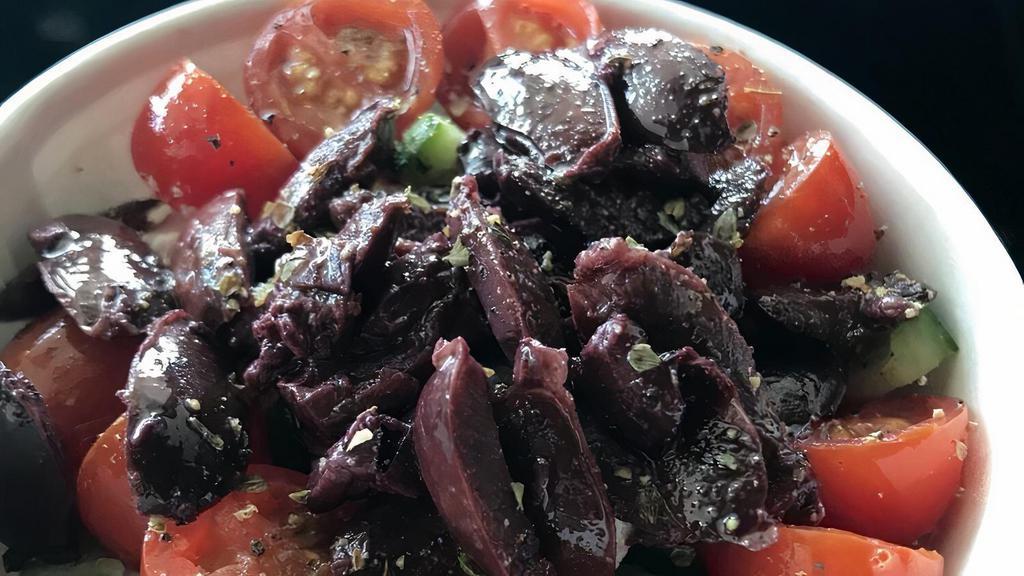 Greek Salad · Persian cucumbers, grape tomatoes, Kalamata olives, olive oil, oregano, Himalayan salt, and crushed black pepper