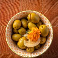 Marinated Olives · Pickled with garlic and lemon. (Vegan & GF)