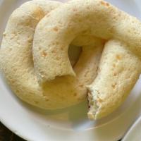Pan De Bono · Baked donut bread made from corn flour, cheese, milk and eggs.