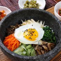 Bibimbap · Served with various side dishes.