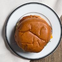 American Burger · 1/2 LB Certified Angus beef Patty with cheddar cheese, lettuce, tomato & onion on a bun.