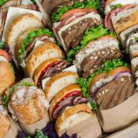 Crafted 12 Half Sandwiches · Our crafted sandwich platter has an assortment of our most popular sandwiches cut in half. C...
