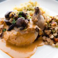 Chipotle Pollo Y Hongos · Pan-seared chicken breast, chipotle cream sauce, frdsh mushrooms, caramelized onions.  Serve...