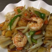 Bangkok Seafood · Sautéed prawns, fish, calamari, mussels with garlic, onion, pineapple, bell peppers, cashew ...