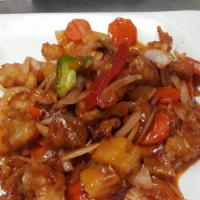 Sweet & Sour Chicken · Chicken breast sautéed with pineapple, onion, green onions, bell pepper and tomatoes in swee...